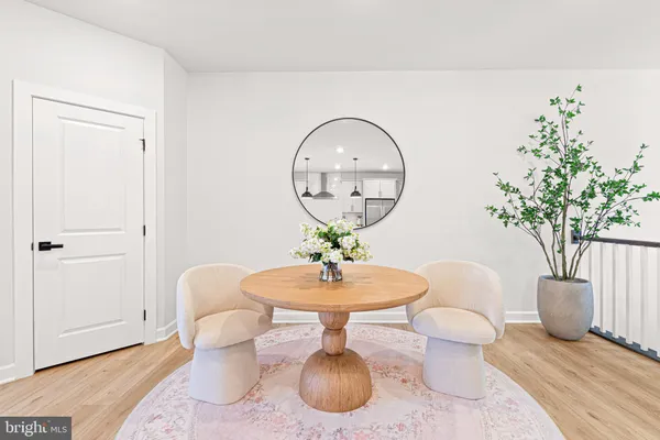 a vase of flowers sitting on a table