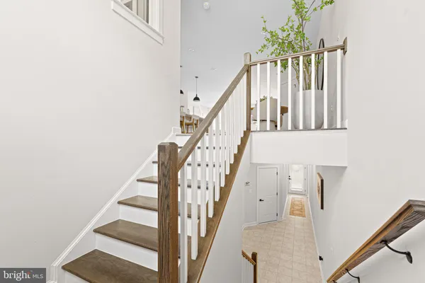 a view of entryway with wooden floor