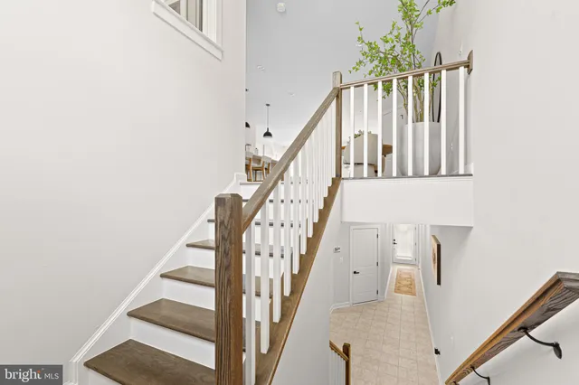 a view of entryway with wooden floor