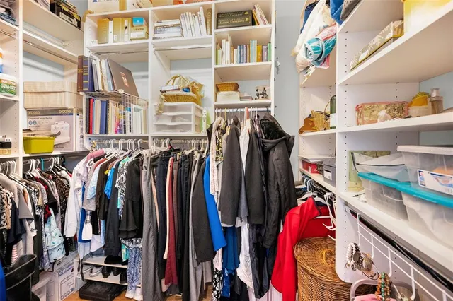 a view of a house with a yard porch and sitting area