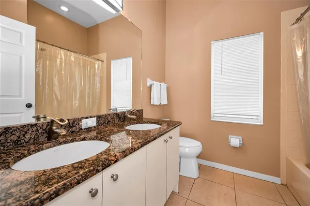 a very nice looking living room with furniture and wooden floor