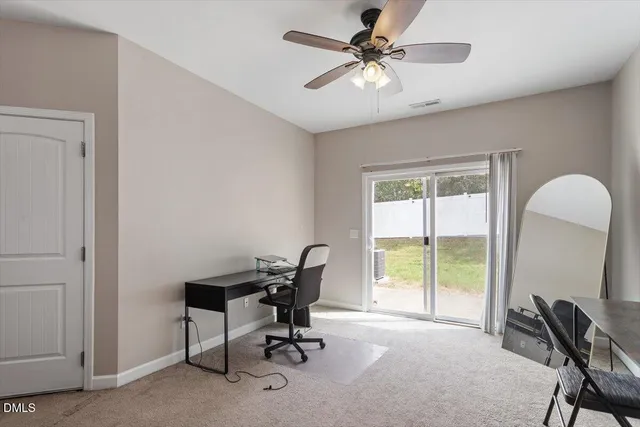 a kitchen with granite countertop a sink stove and cabinets