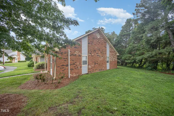 a view of a back yard of the house