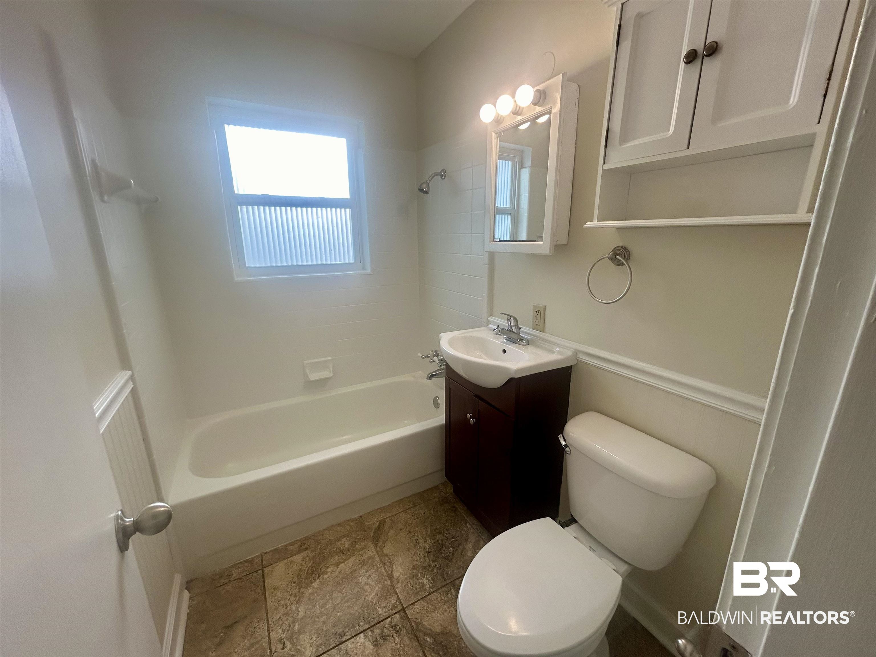187 Van Hoosen Road Flomaton, AL 36441 - Photo 16 of 29 Bathroom featuring vanity and shower / washtub combination