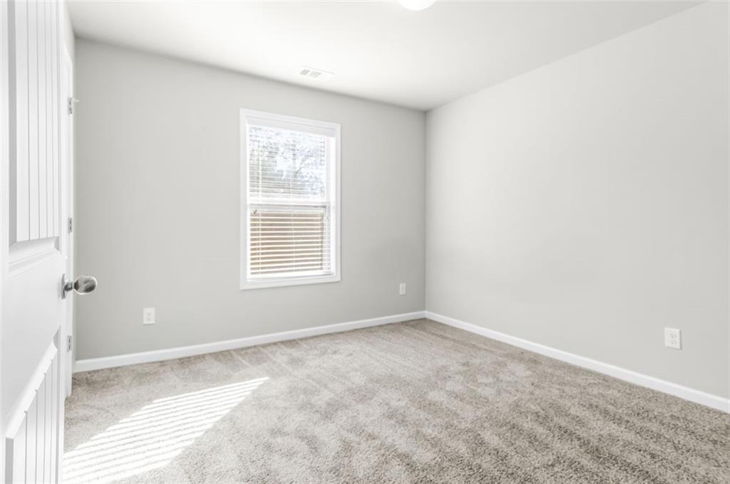 4237 Water Mill Drive Buford, GA 30519 - Photo 28 of 35 a view of an empty room with a window