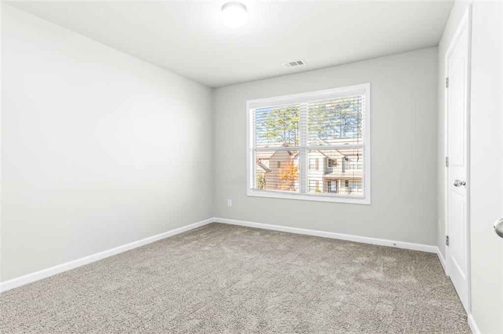4237 Water Mill Drive Buford, GA 30519 - Photo 30 of 35 an empty room with a window