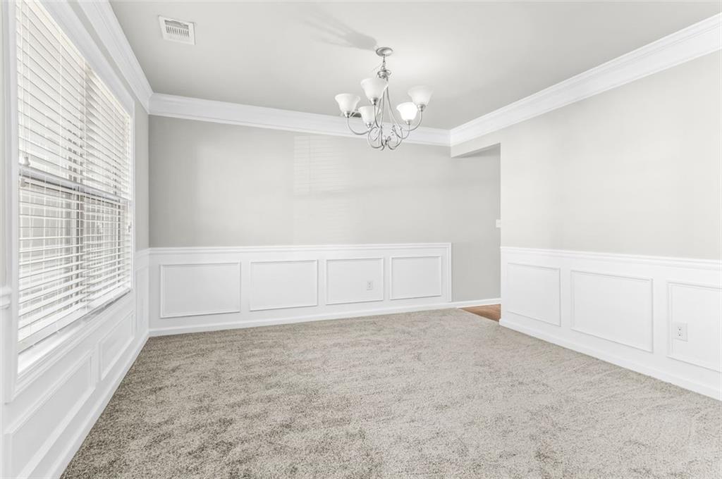 4237 Water Mill Drive Buford, GA 30519 - Photo 6 of 35 a view of an empty room with a window