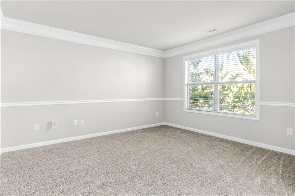 4237 Water Mill Drive Buford, GA 30519 - Photo 10 of 35 an empty room with a window