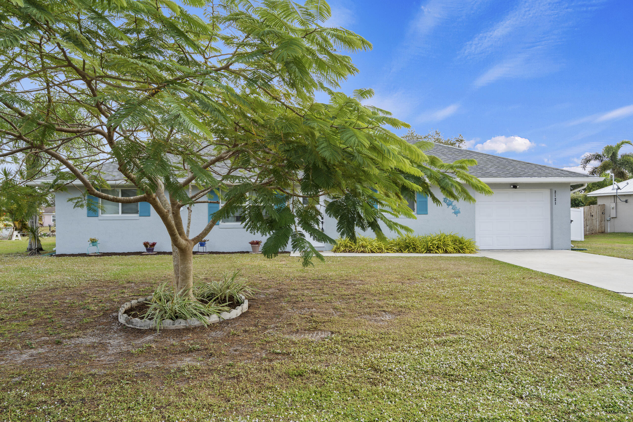 2121 Southeast Midtown Road Port St. Lucie, FL 34952 - Photo 2 of 42 a view of outdoor space and yard