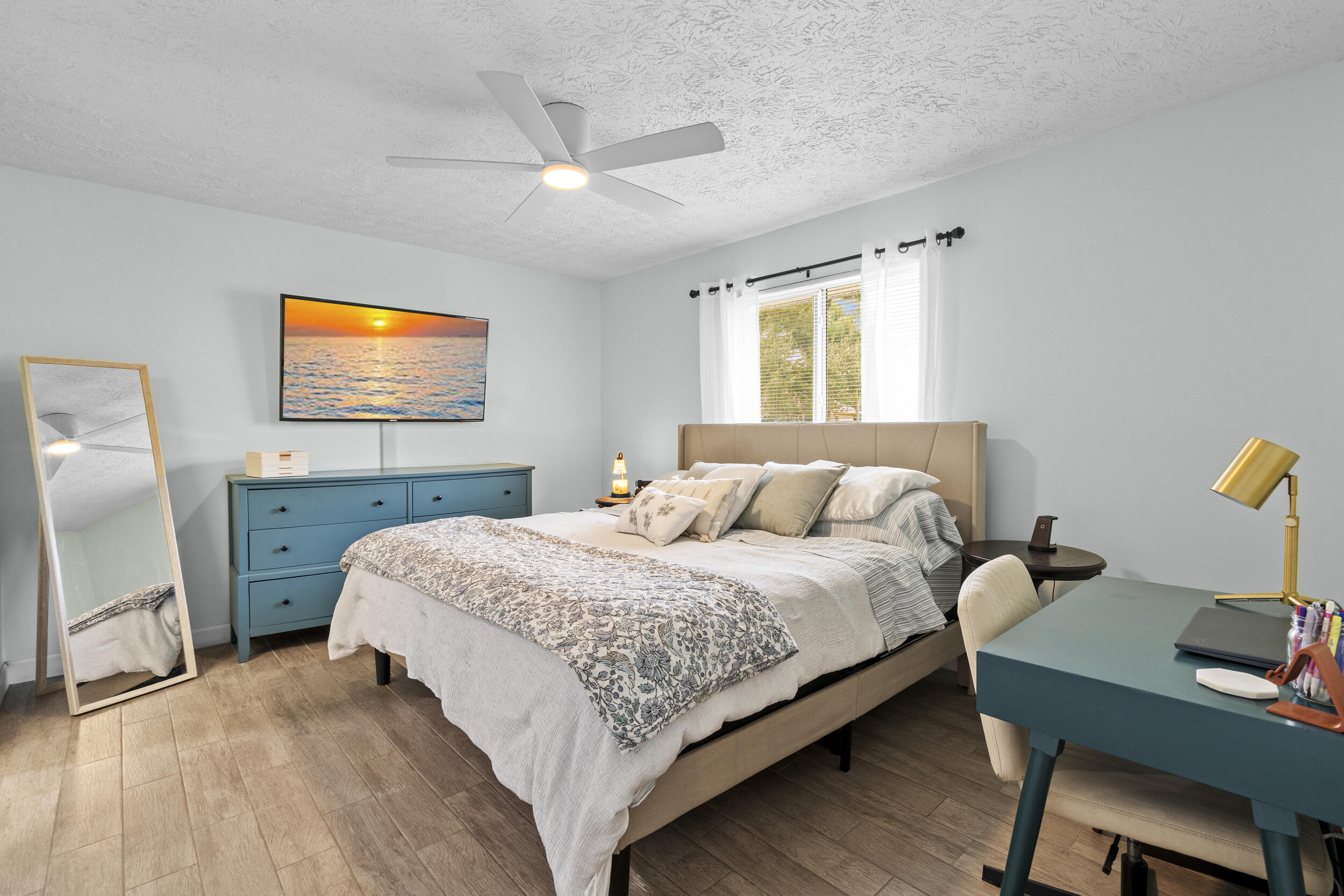 2121 Southeast Midtown Road Port St. Lucie, FL 34952 - Photo 21 of 42 a bedroom with a bed and a desk