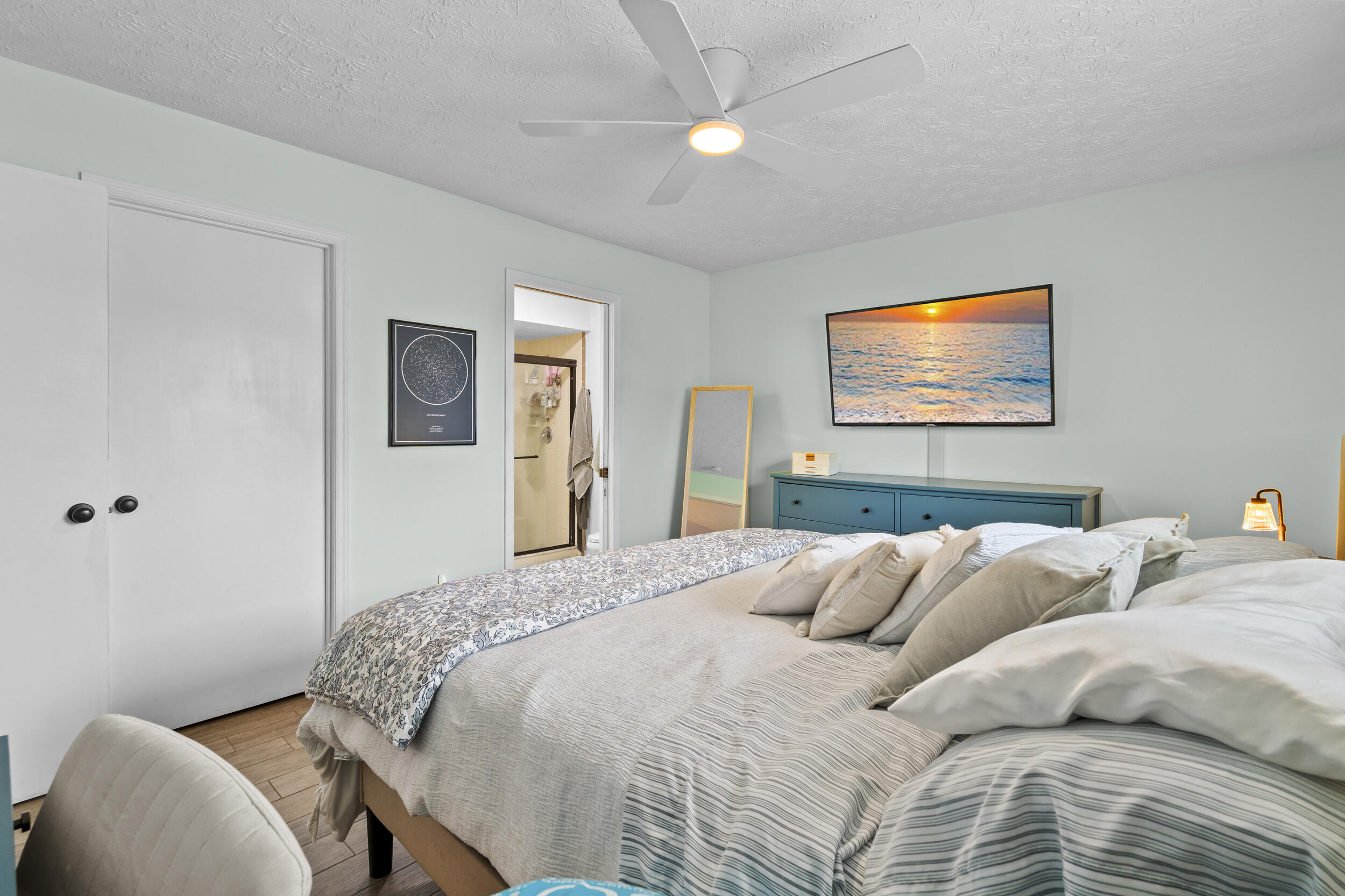 2121 Southeast Midtown Road Port St. Lucie, FL 34952 - Photo 22 of 42 a bed room with a bed window and wall painting