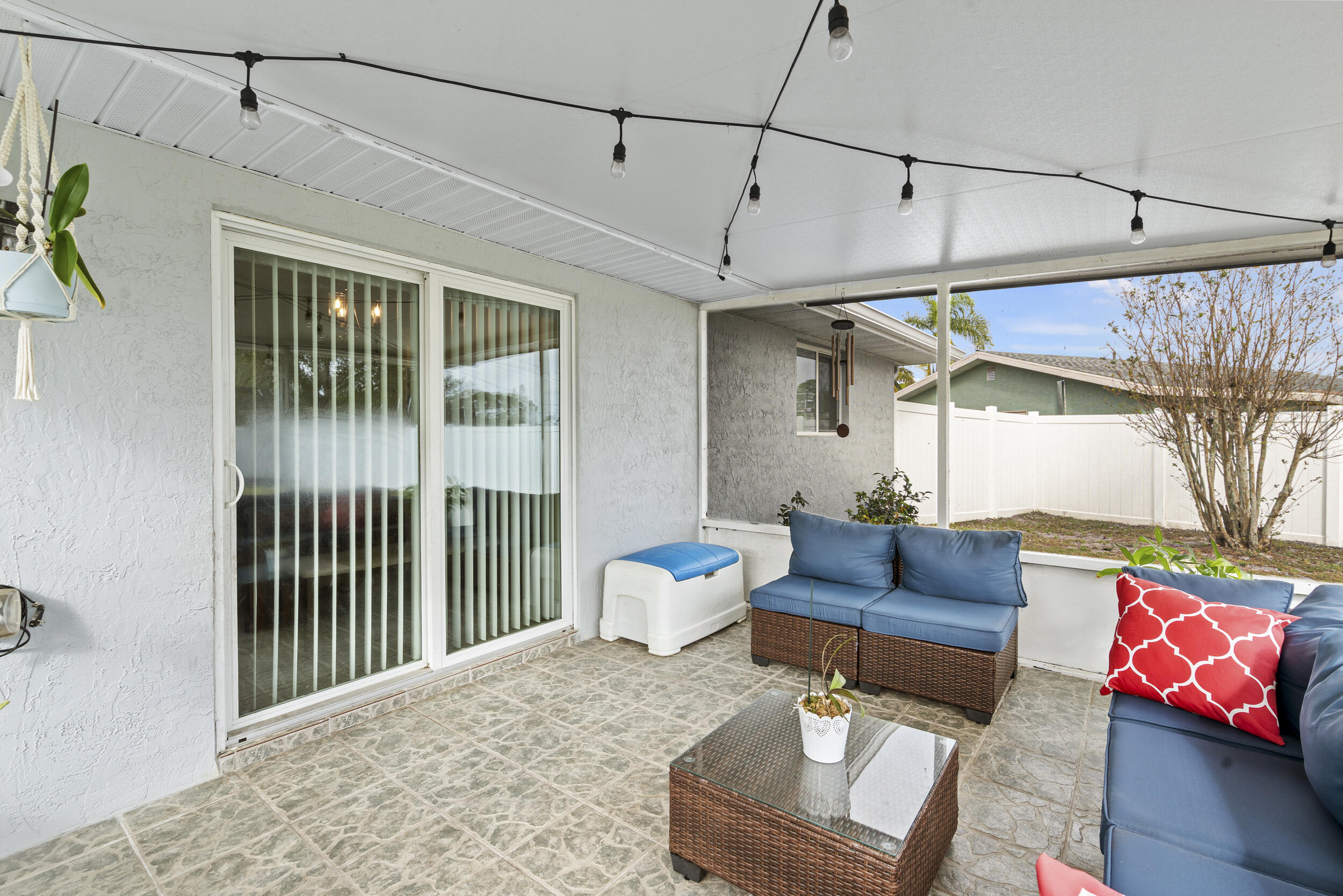 2121 Southeast Midtown Road Port St. Lucie, FL 34952 - Photo 36 of 42 a living room with furniture and a window