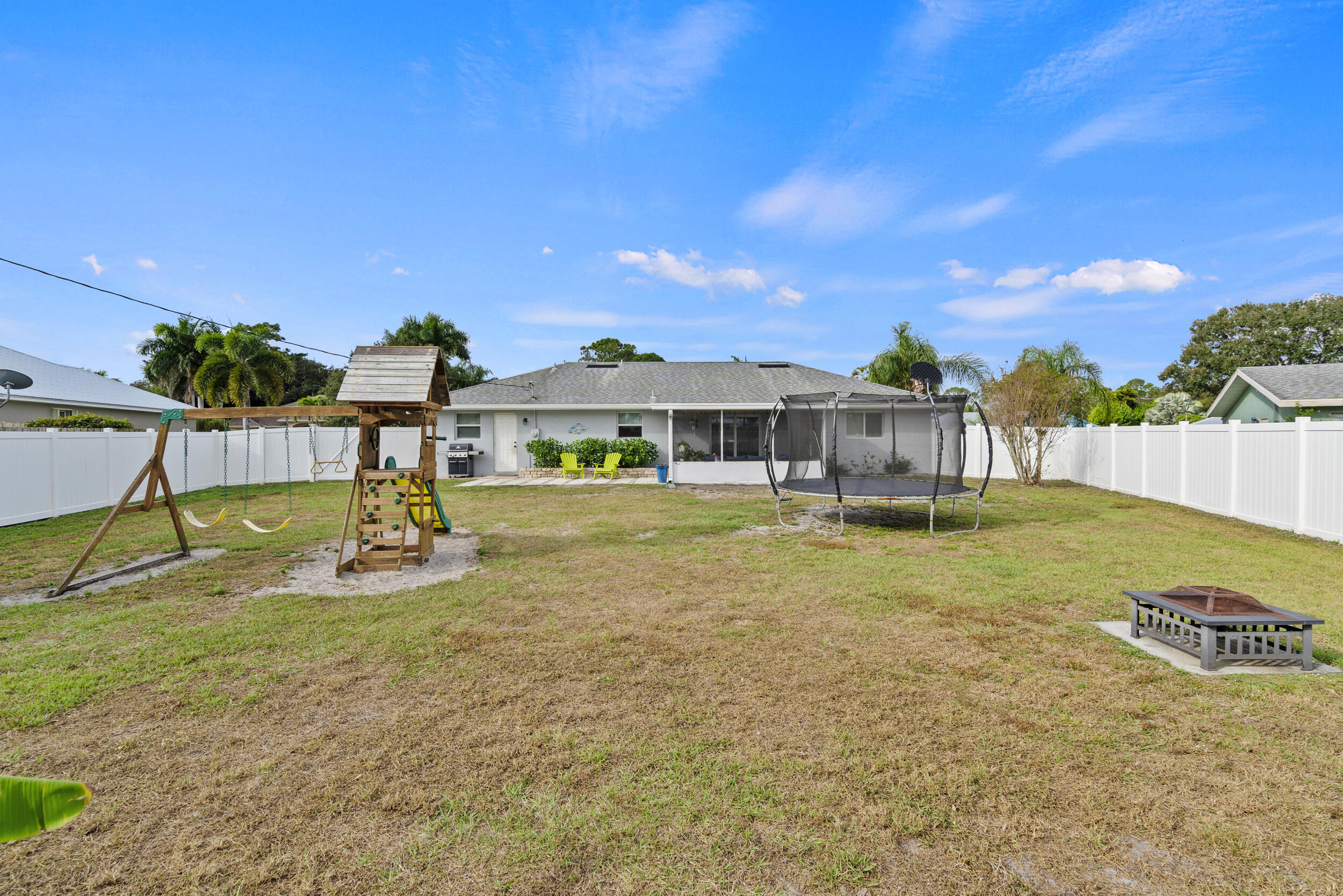 2121 Southeast Midtown Road Port St. Lucie, FL 34952 - Photo 41 of 42 a view of a house with swimming pool and sitting area