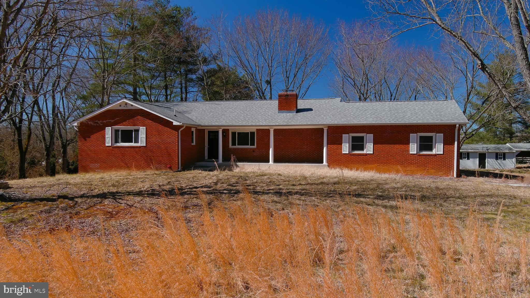 Beautiful Brick Rambler on a Private 2 Acre Lot