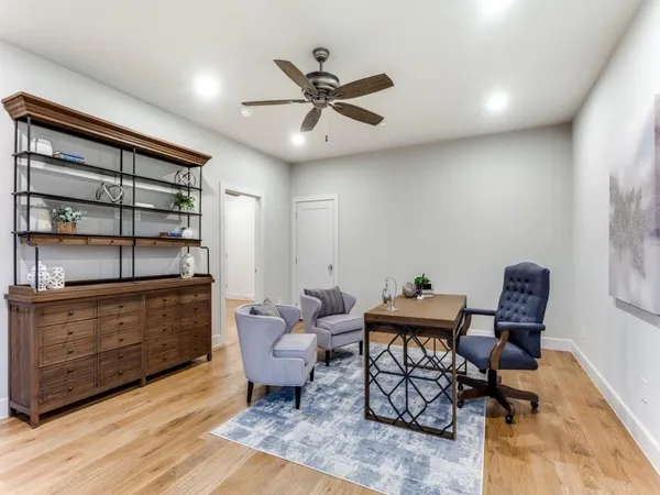 a living room with furniture and decor