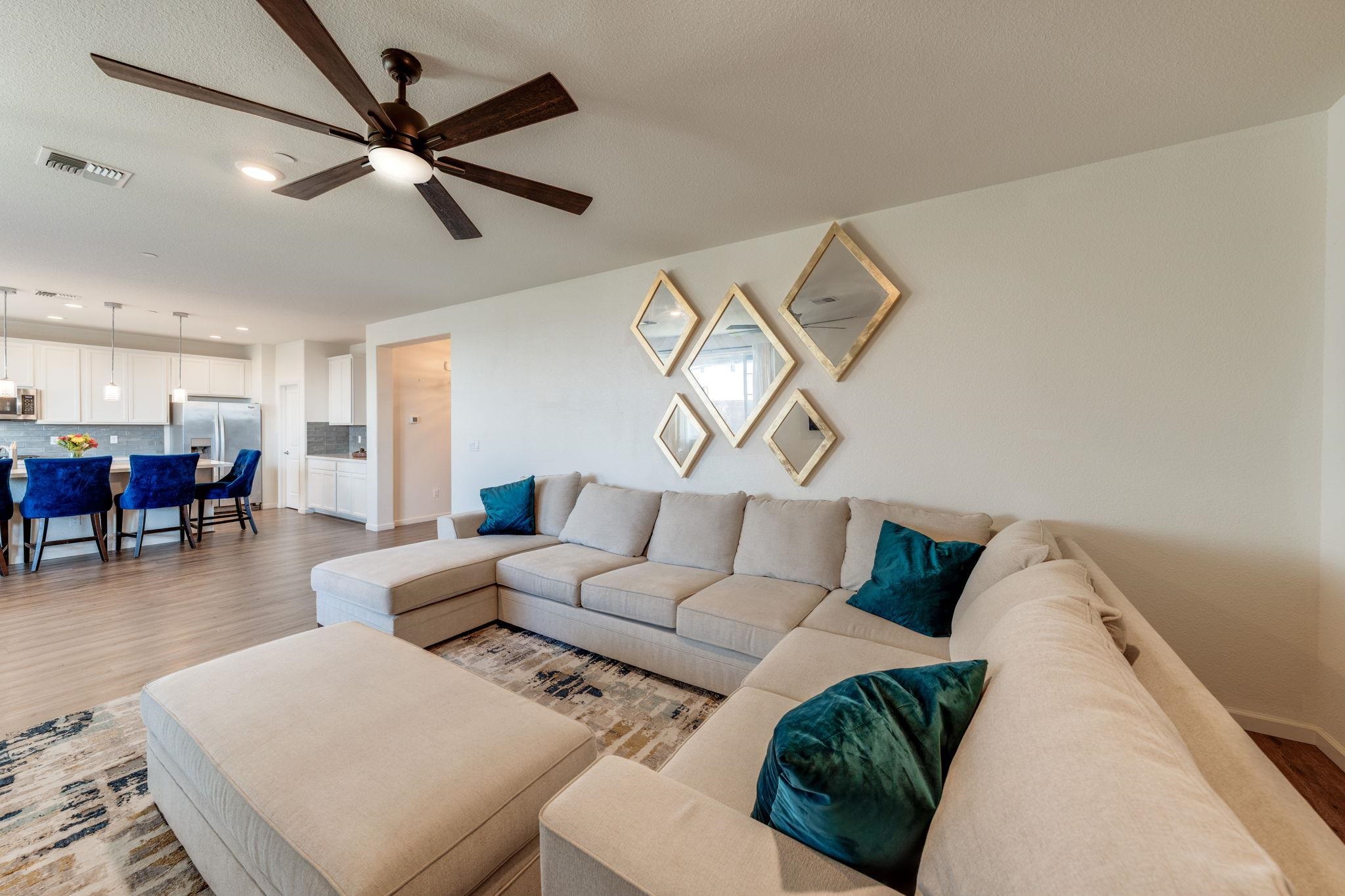 1305 Stark Bridge Road Lincoln, CA 95648 - Photo 15 of 53 a living room with furniture and a chandelier
