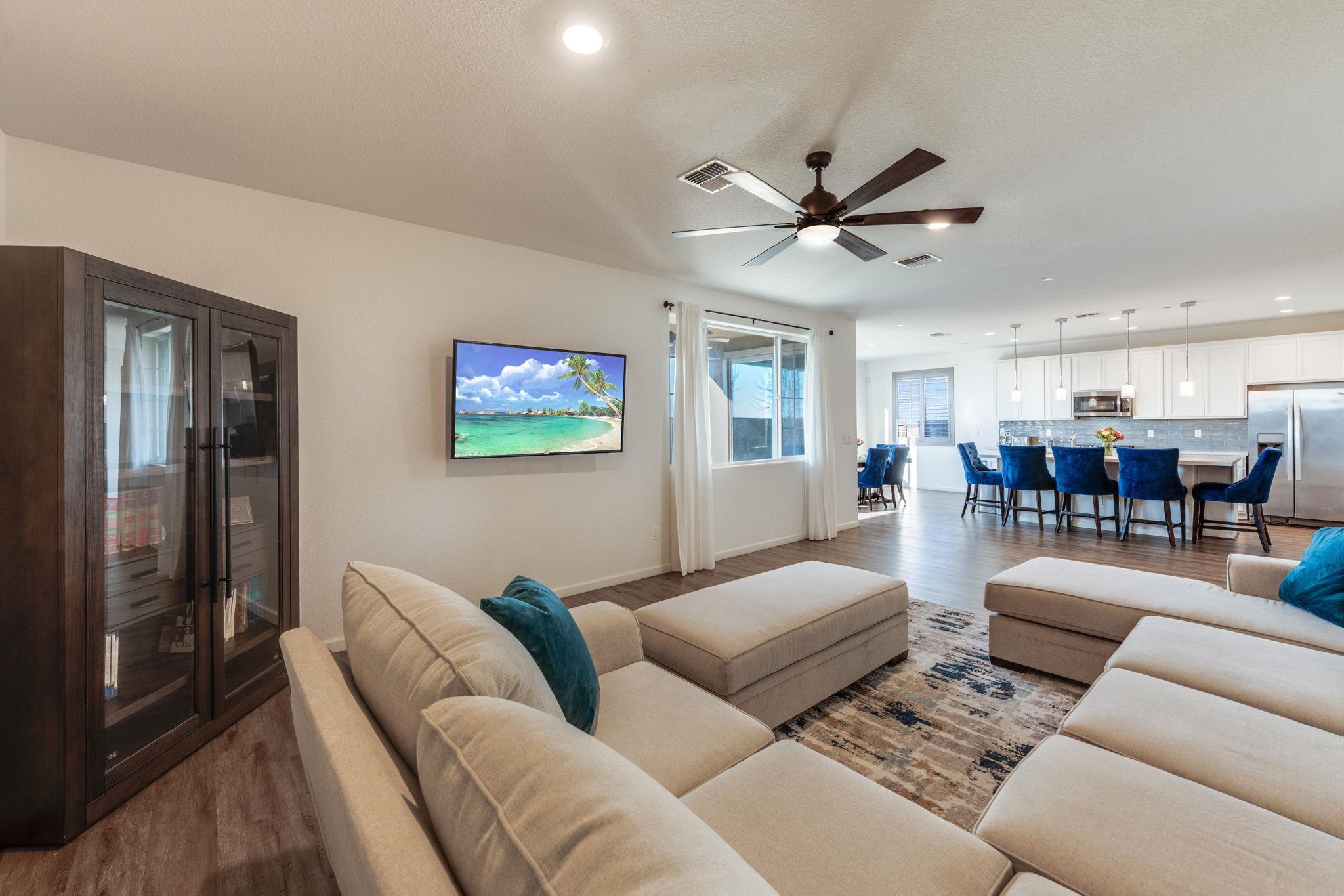 1305 Stark Bridge Road Lincoln, CA 95648 - Photo 16 of 53 a living room with furniture kitchen view and a chandelier