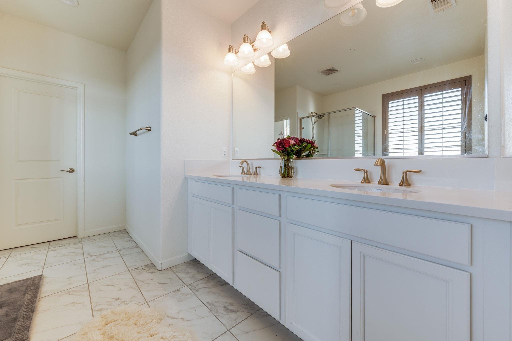 1305 Stark Bridge Road Lincoln, CA 95648 - Photo 26 of 53 a bathroom with a sink and a mirror