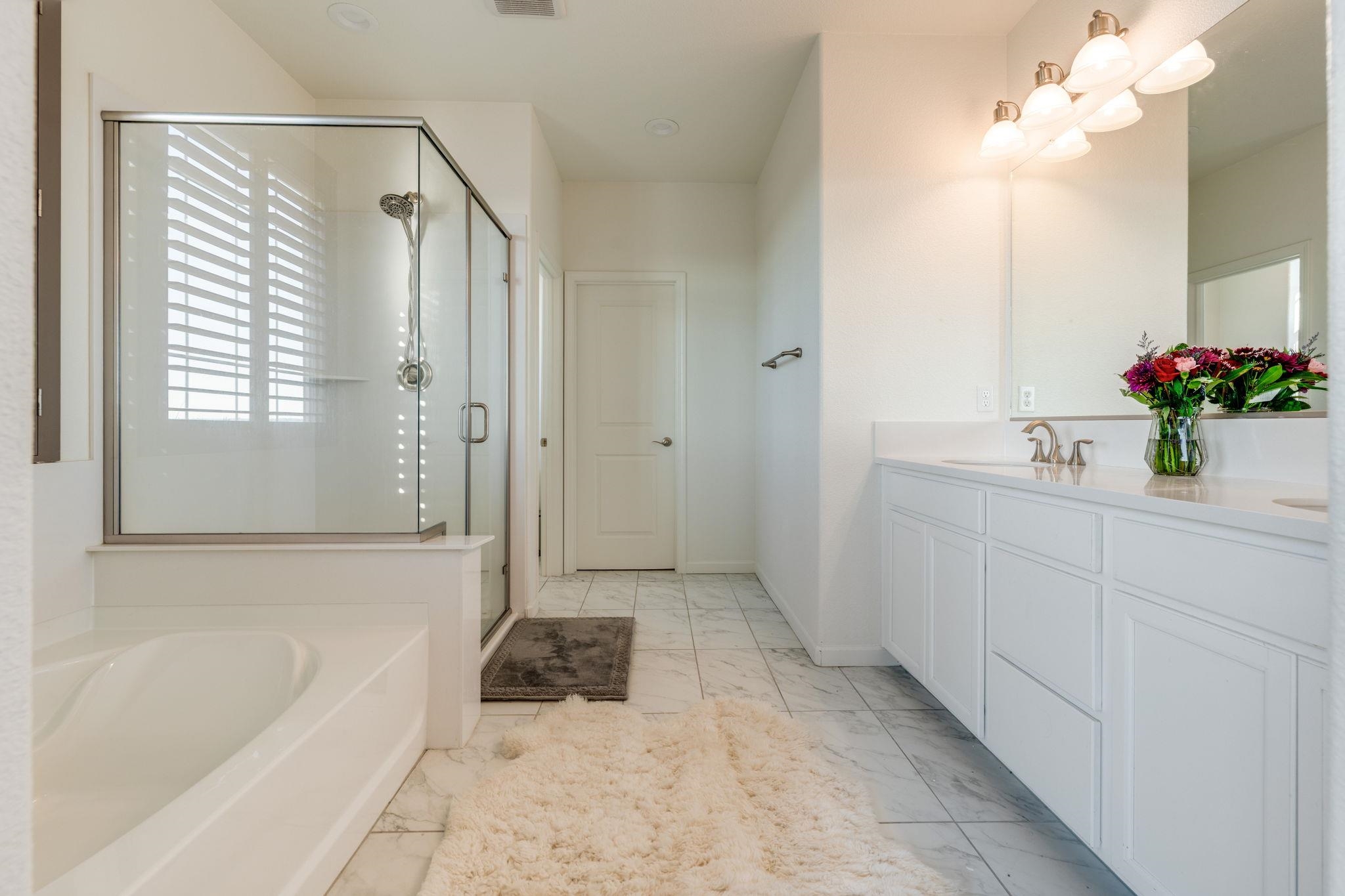 1305 Stark Bridge Road Lincoln, CA 95648 - Photo 27 of 53 a bathroom with a tub sink and mirror