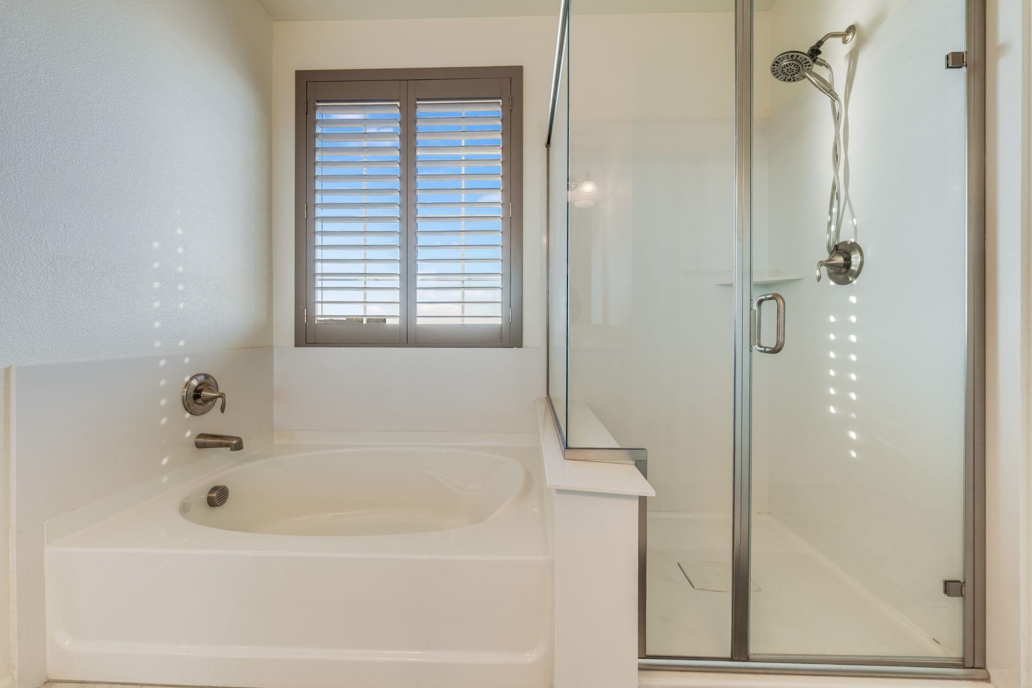 1305 Stark Bridge Road Lincoln, CA 95648 - Photo 28 of 53 a white bath tub sitting next to a shower