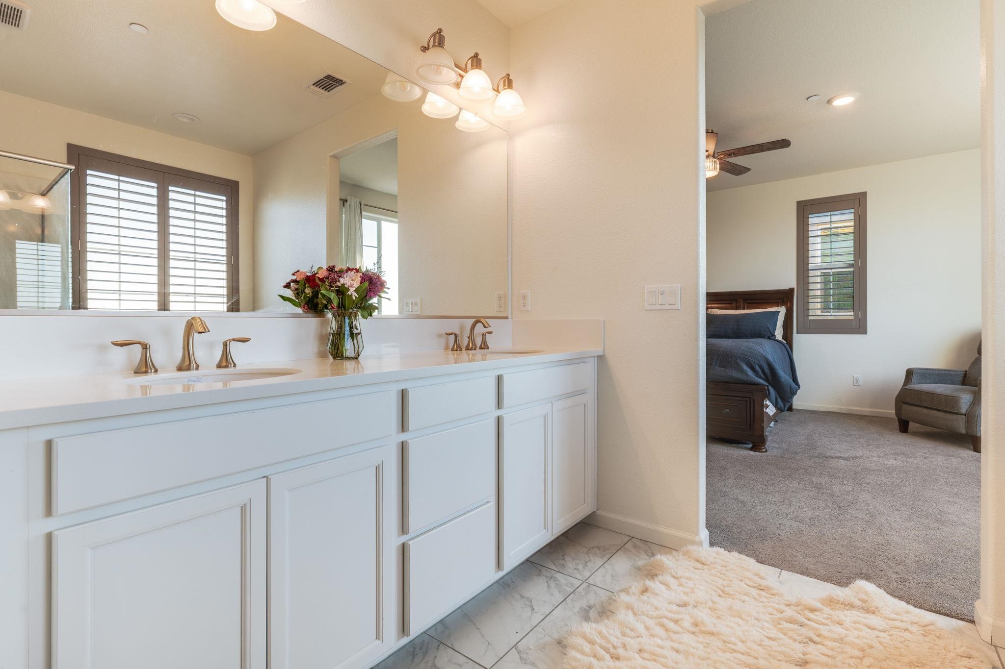 1305 Stark Bridge Road Lincoln, CA 95648 - Photo 30 of 53 a en suite bathroom with double sink and a mirror