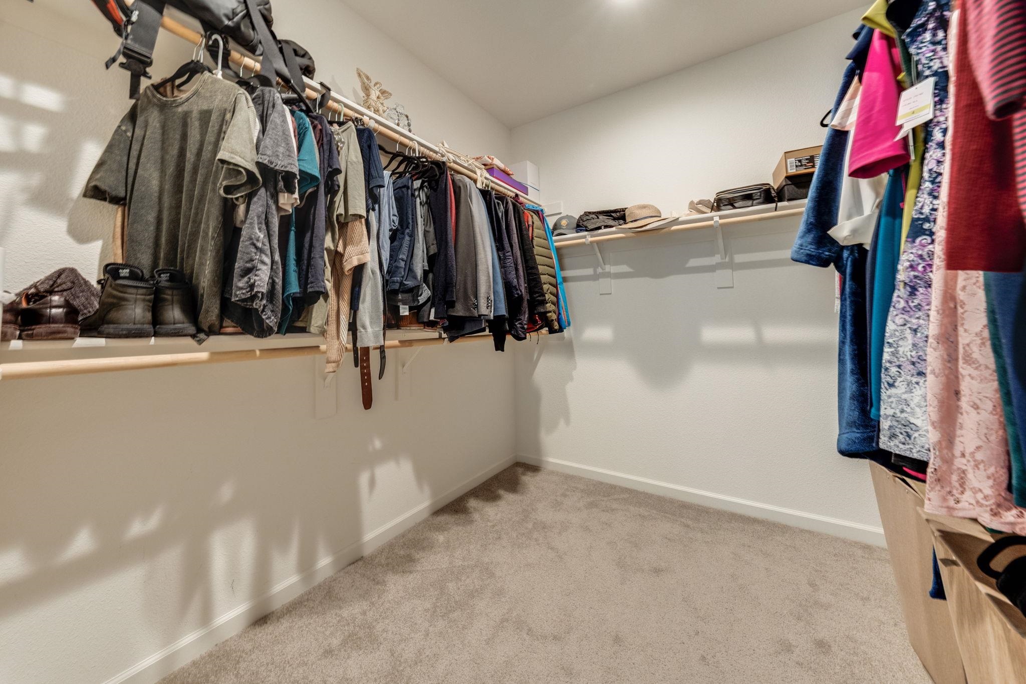 1305 Stark Bridge Road Lincoln, CA 95648 - Photo 32 of 53 a view of walk in closet with clothes and shoes