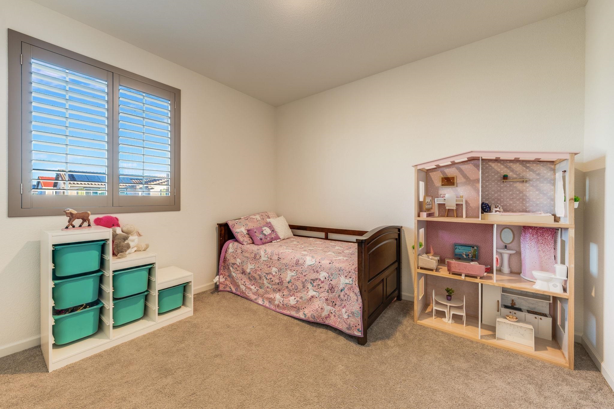 1305 Stark Bridge Road Lincoln, CA 95648 - Photo 33 of 53 a bedroom with furniture and a book shelf