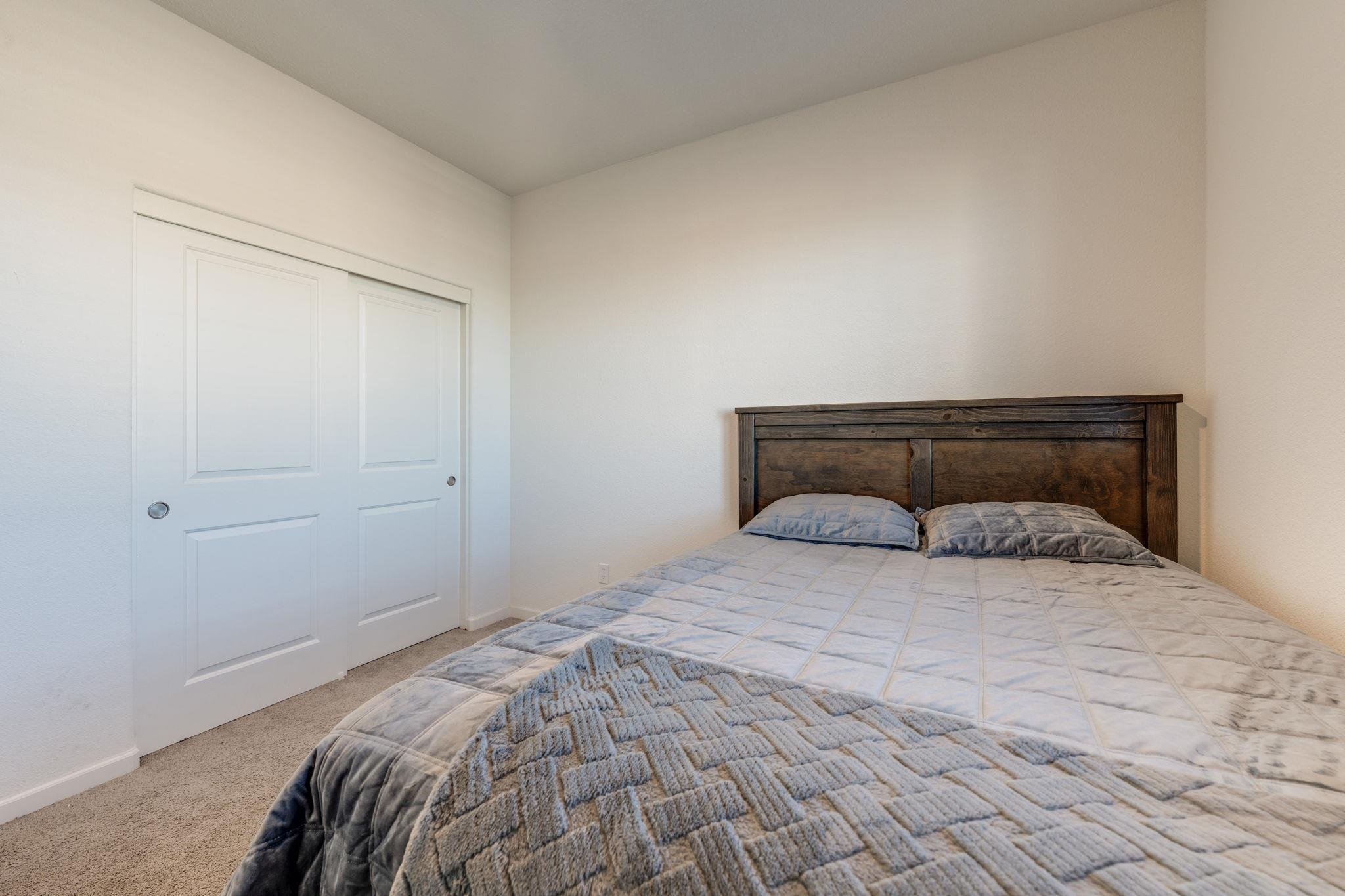 1305 Stark Bridge Road Lincoln, CA 95648 - Photo 40 of 53 a bedroom with a bed and a window