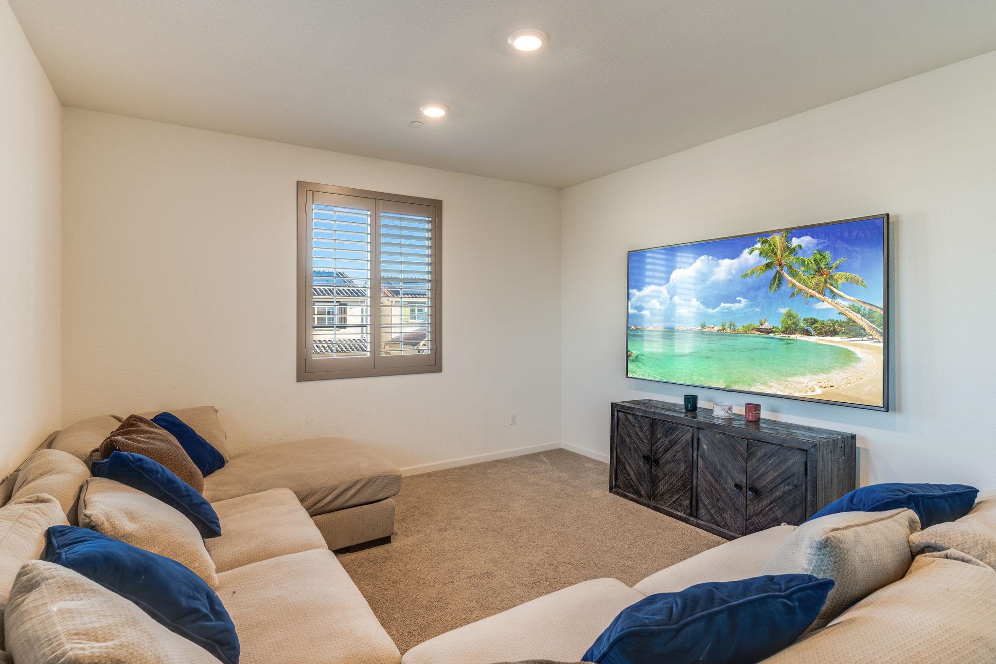 1305 Stark Bridge Road Lincoln, CA 95648 - Photo 42 of 53 a living room with furniture and a flat screen tv