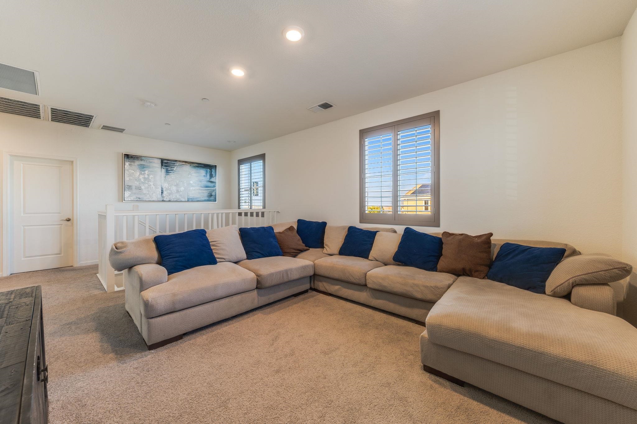 1305 Stark Bridge Road Lincoln, CA 95648 - Photo 43 of 53 a living room with furniture and a window