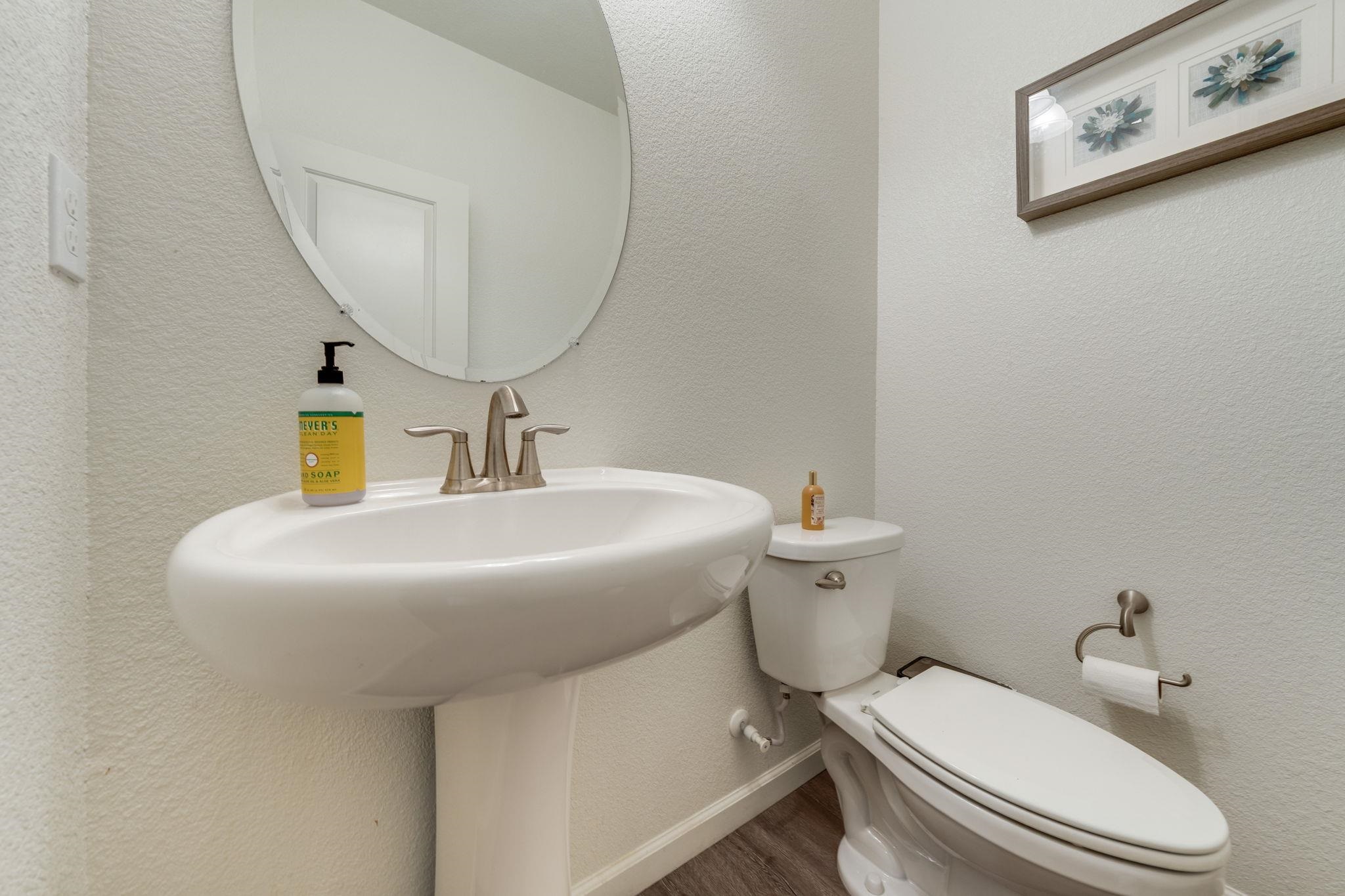 1305 Stark Bridge Road Lincoln, CA 95648 - Photo 44 of 53 a bathroom with a sink a toilet and mirror