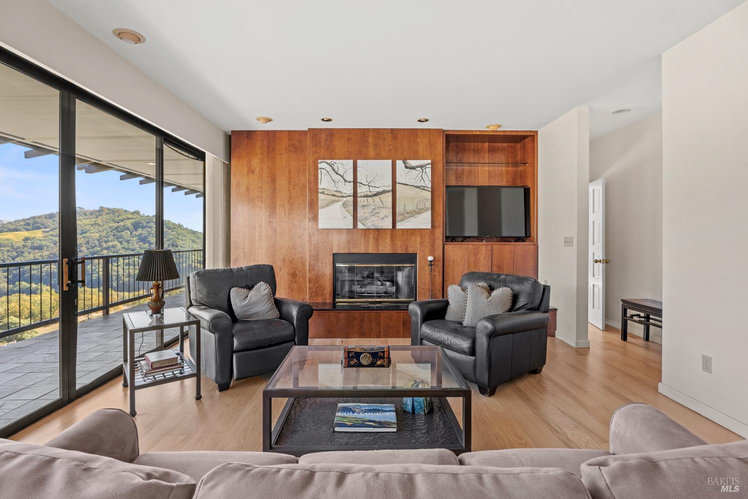 241 Henry Station Road Ukiah, CA 95482 - Photo 41 of 76 a living room with fireplace furniture and a large window