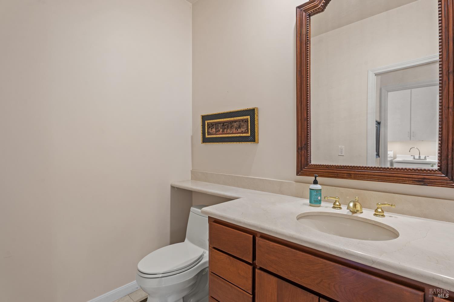 241 Henry Station Road Ukiah, CA 95482 - Photo 45 of 76 a bathroom with a sink toilet and mirror