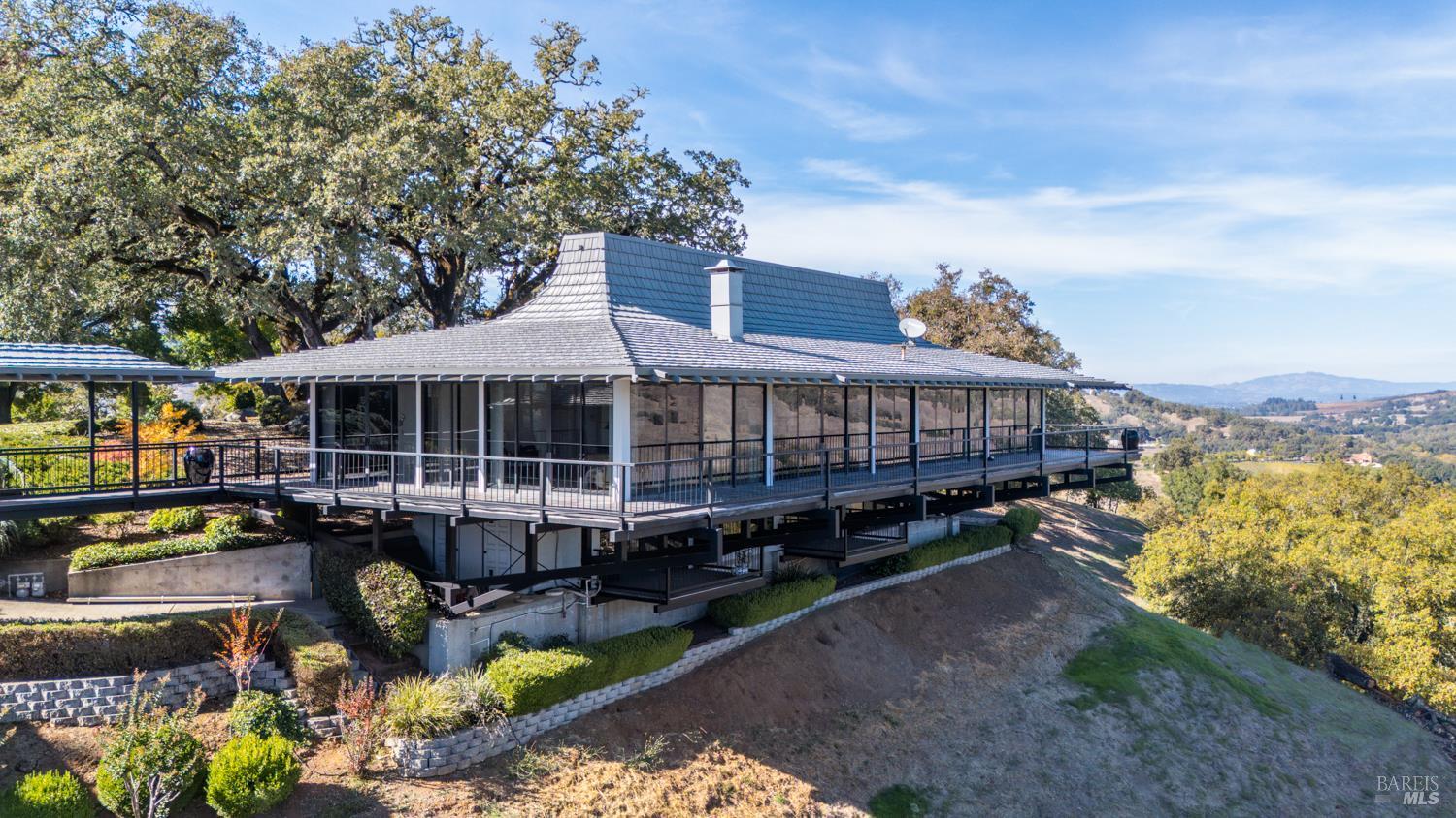 241 Henry Station Road Ukiah, CA 95482 - Photo 7 of 76 an aerial view of a house with swimming pool and a yard