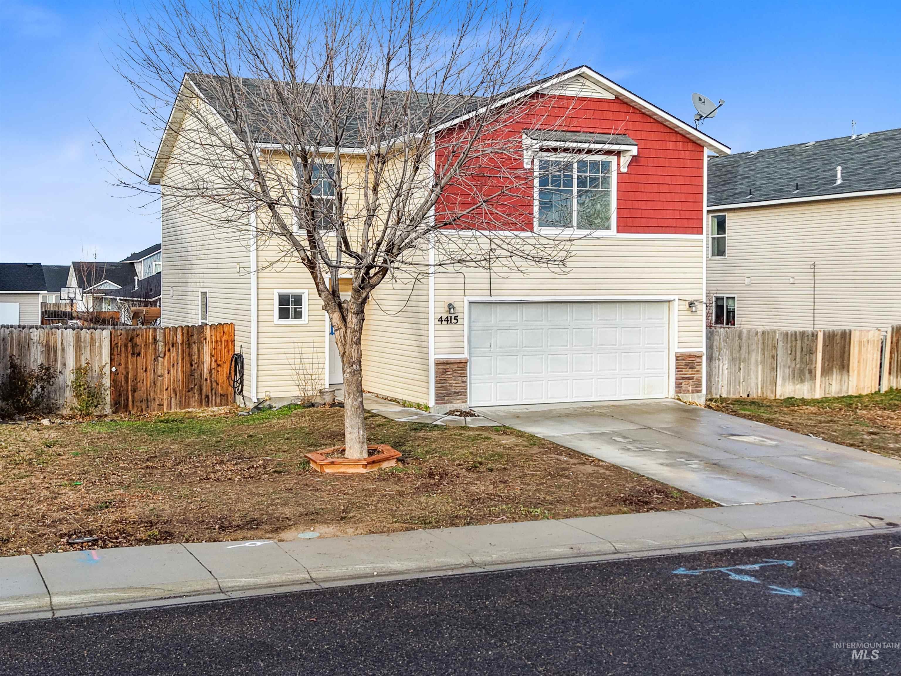 4415 Duke Street Caldwell, ID 83607 - Photo 2 of 22 Traditional home with concrete driveway and a garage