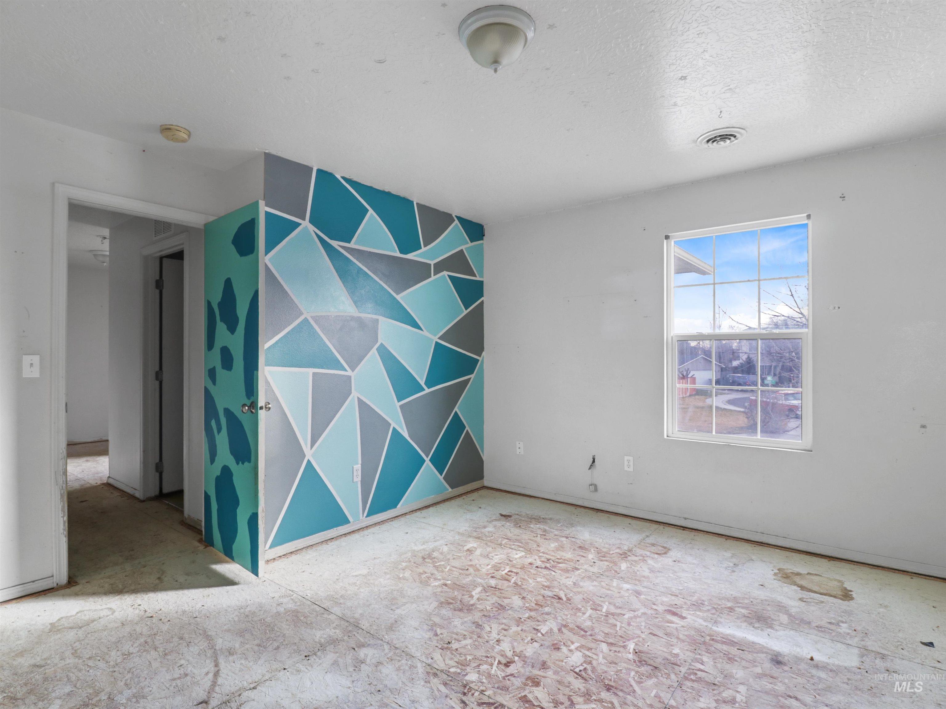 4415 Duke Street Caldwell, ID 83607 - Photo 20 of 22 Spare room with a textured ceiling