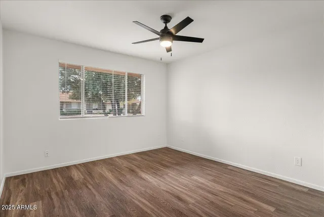 a kitchen with a sink stove top oven and cabinets