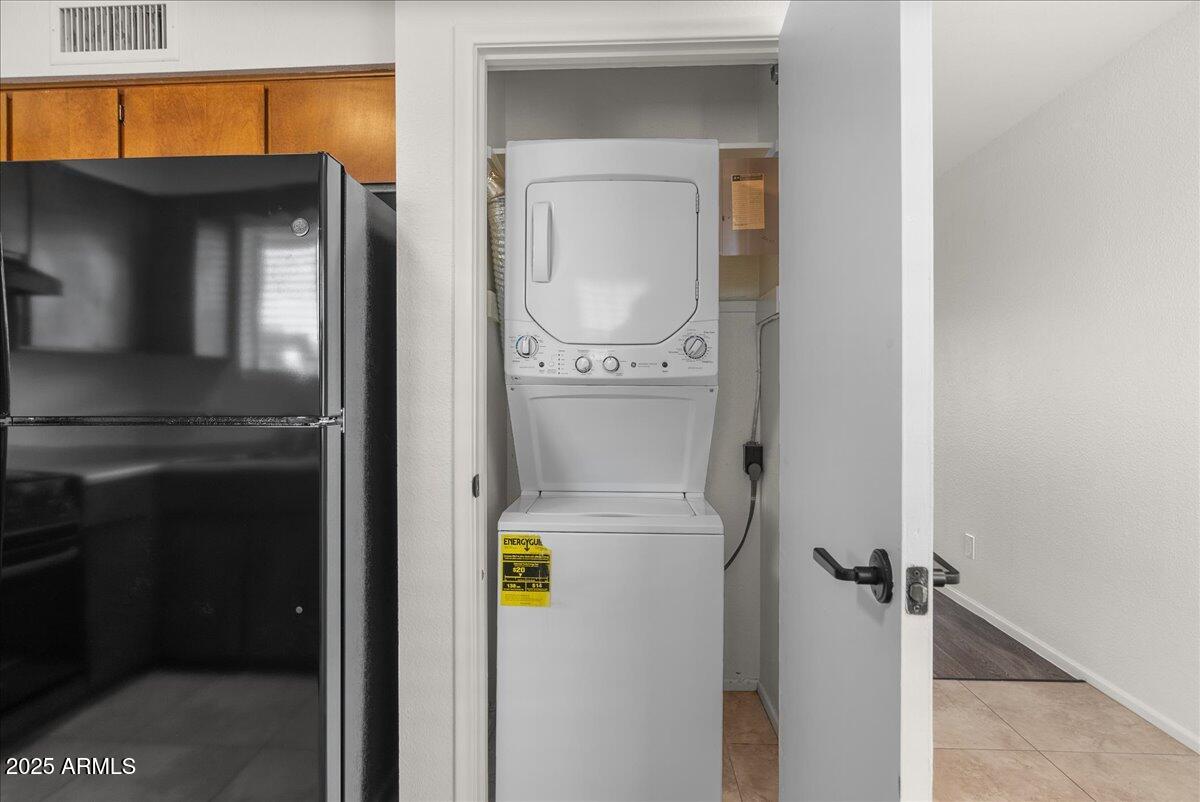 6438 East Butte Street, Unit 3 Mesa, AZ 85205 - Photo 18 of 24 a utility room with dryer and washer