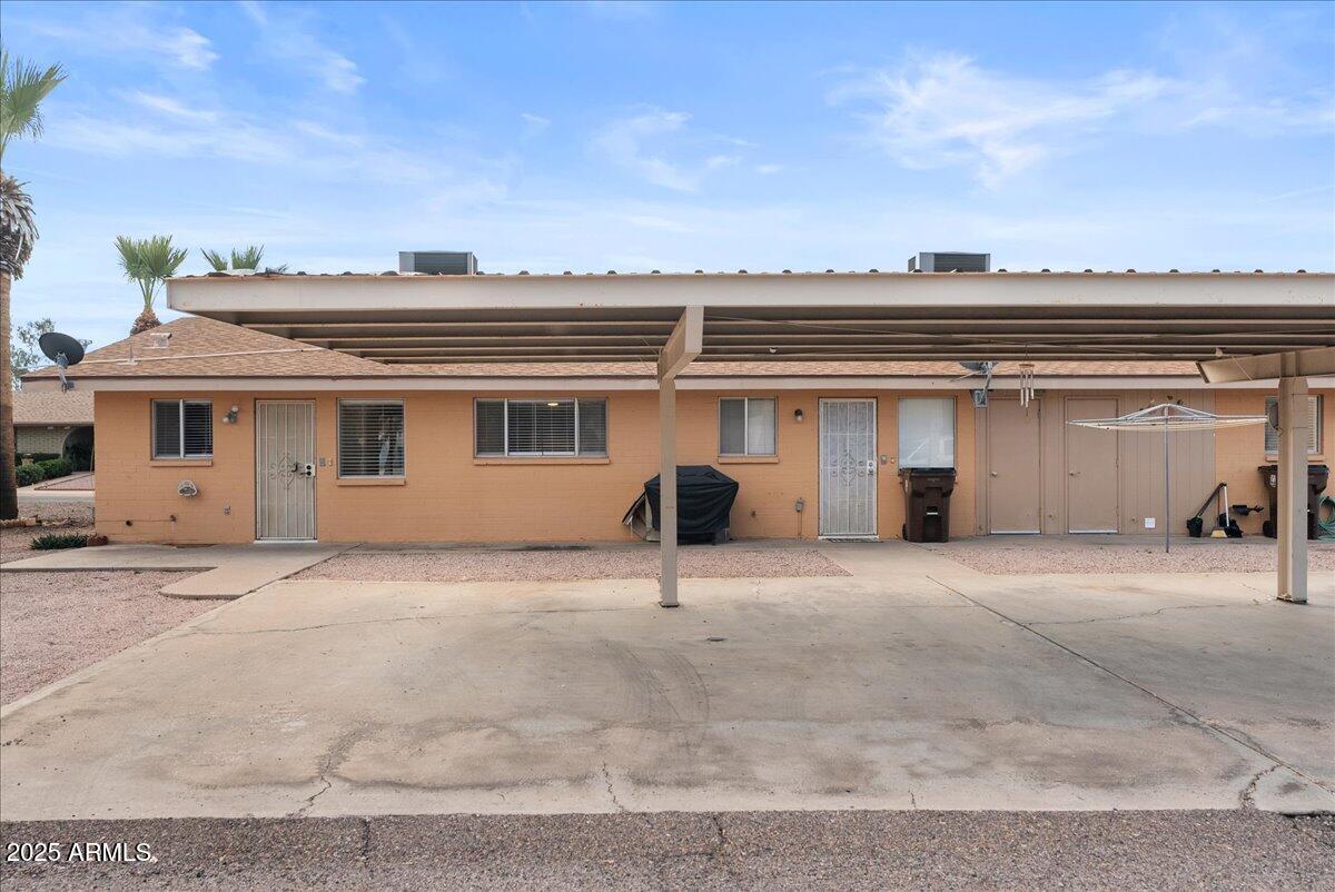 6438 East Butte Street, Unit 3 Mesa, AZ 85205 - Photo 20 of 24 a house view with a backyard space