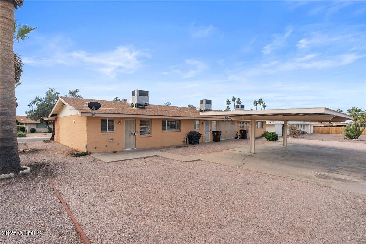 6438 East Butte Street, Unit 3 Mesa, AZ 85205 - Photo 21 of 24 a view of a house with a terrace