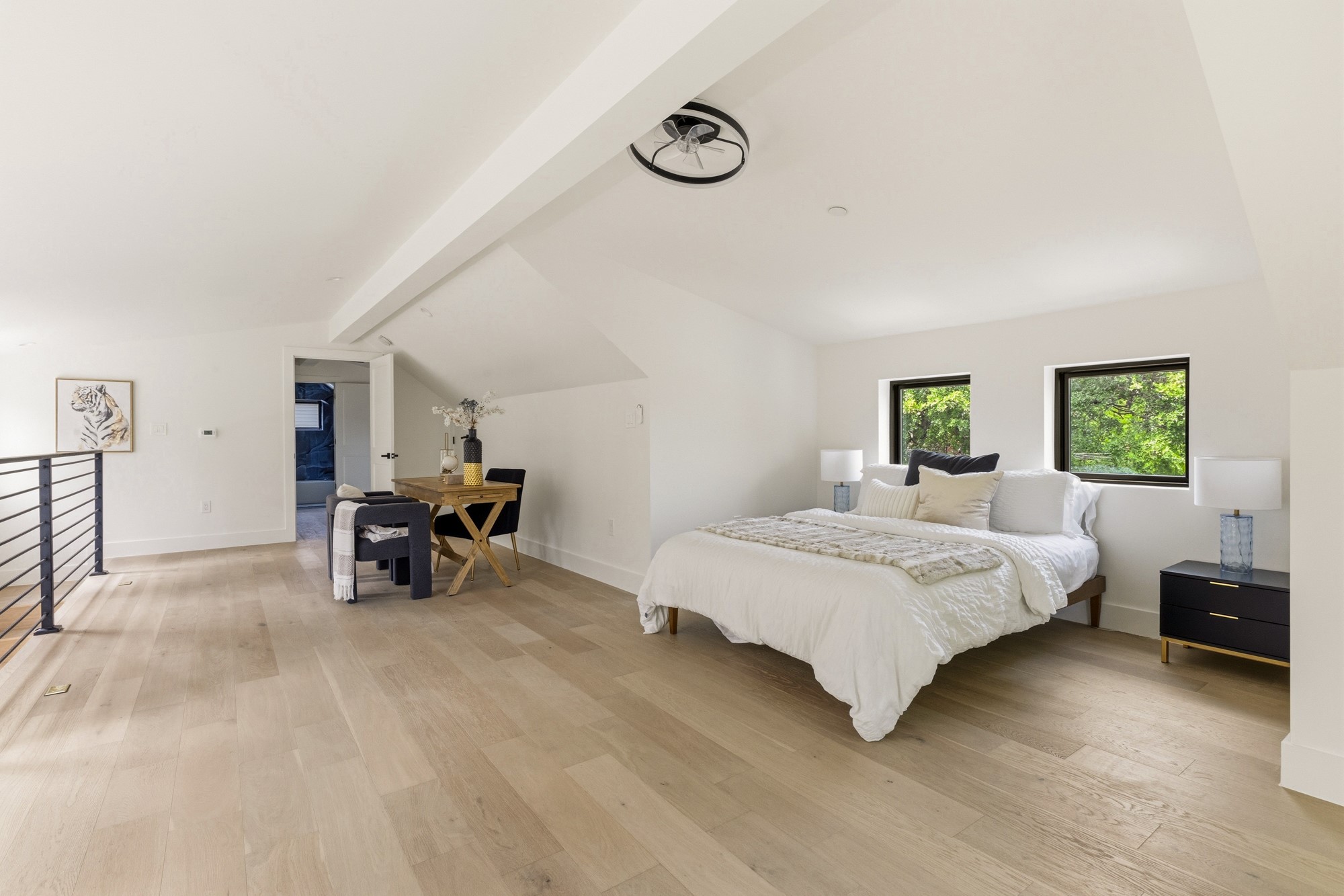 2300 Bluebonnet Lane Austin, TX 78704 - Photo 29 of 40 a spacious bedroom with a bed and a window