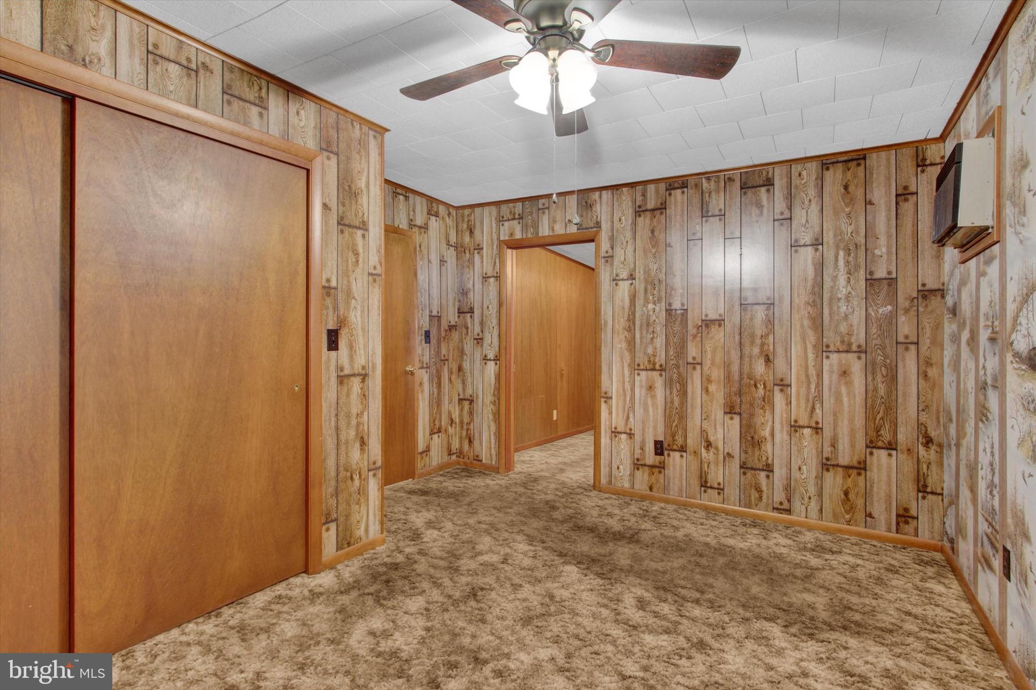 22 Cemetery Street Littlestown, PA 17340 - Photo 27 of 34 a view of a bathroom with a shower and a mirror