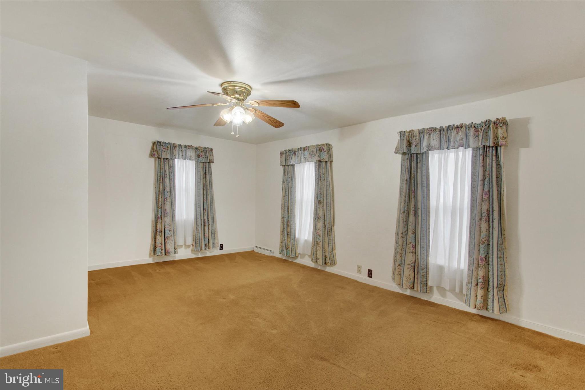 22 Cemetery Street Littlestown, PA 17340 - Photo 29 of 34 a view of an empty room with chandelier fan