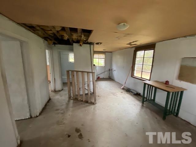 611 Jean Street Roxboro, NC 27573 - Photo 2 of 7 a view of a hallway with windows