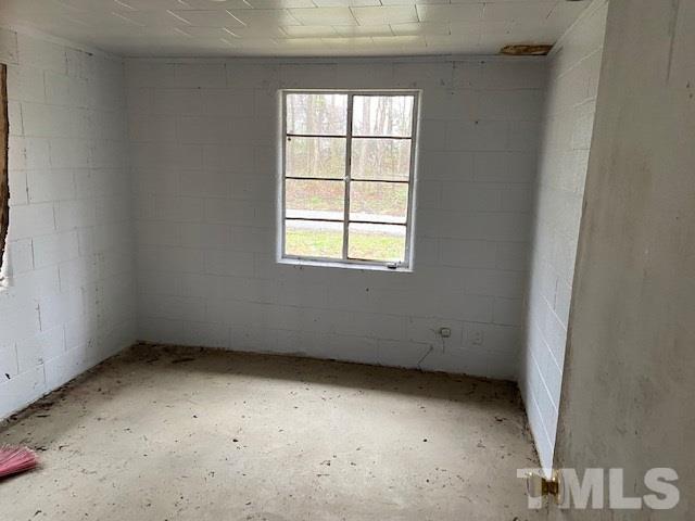 611 Jean Street Roxboro, NC 27573 - Photo 4 of 7 an empty room with a window