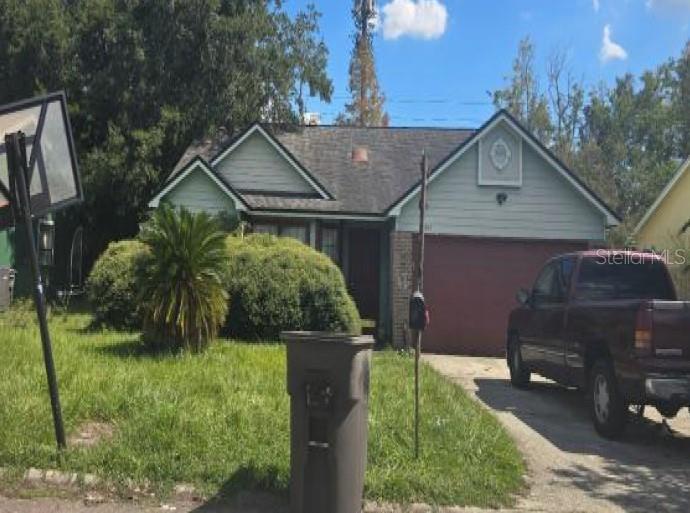 3861 Winter Berry Road East Jacksonville, FL 32210 - Photo 1 of 1 a house view with a backyard space