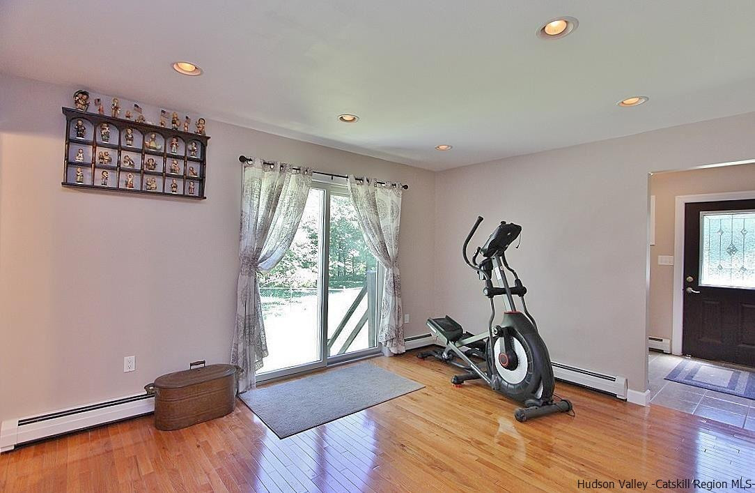 124 Blue Mountain Road Saugerties, NY 12477 - Photo 13 of 29 a view of a room with gym equipment