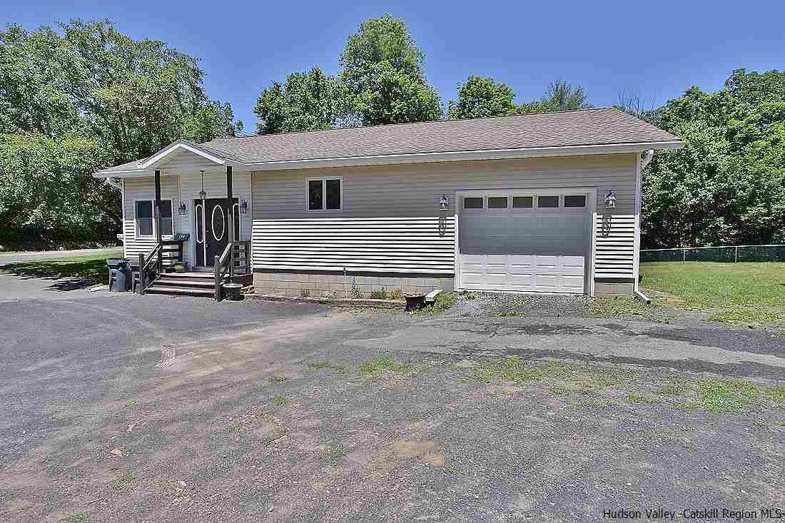 124 Blue Mountain Road Saugerties, NY 12477 - Photo 2 of 29 a view of a house with backyard and trees