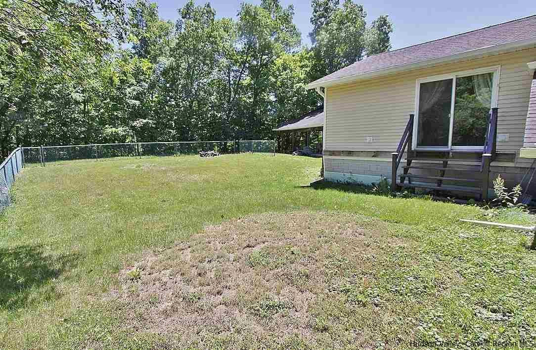 124 Blue Mountain Road Saugerties, NY 12477 - Photo 23 of 29 a view of a house with backyard and a garden