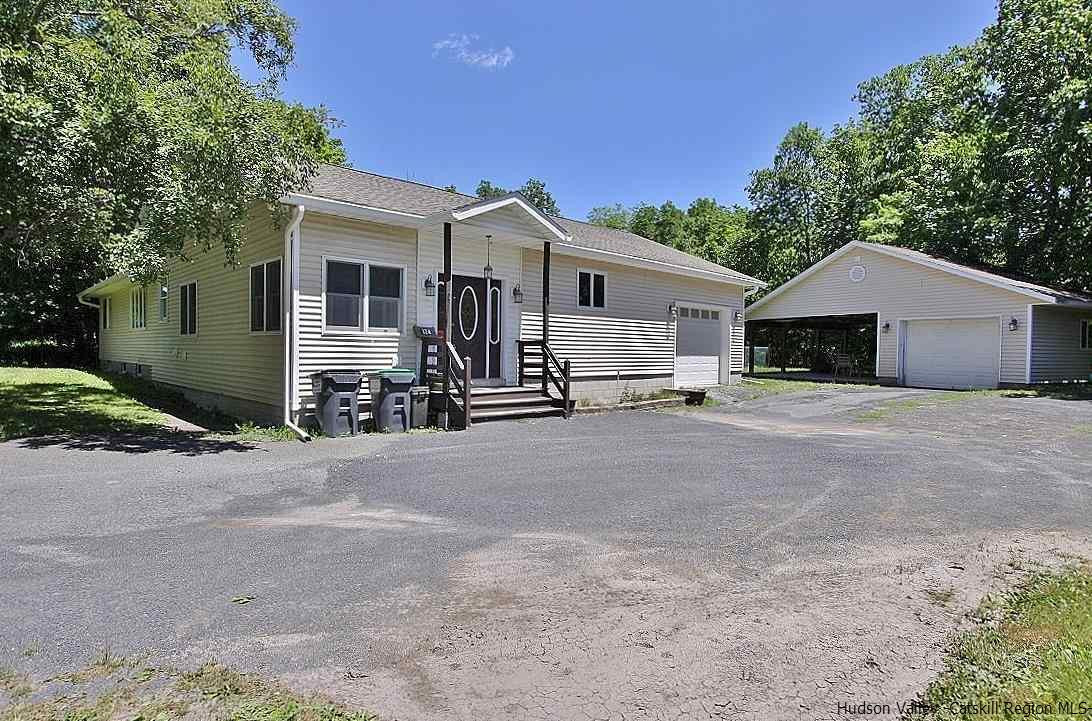 124 Blue Mountain Road Saugerties, NY 12477 - Photo 29 of 29 a view of a house with a yard and large tree